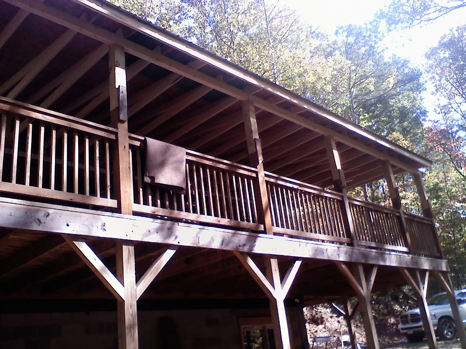 Timber framing under a new elevated porch and deck — Roof Leak Repair in Holyoke by Roofing Brothers